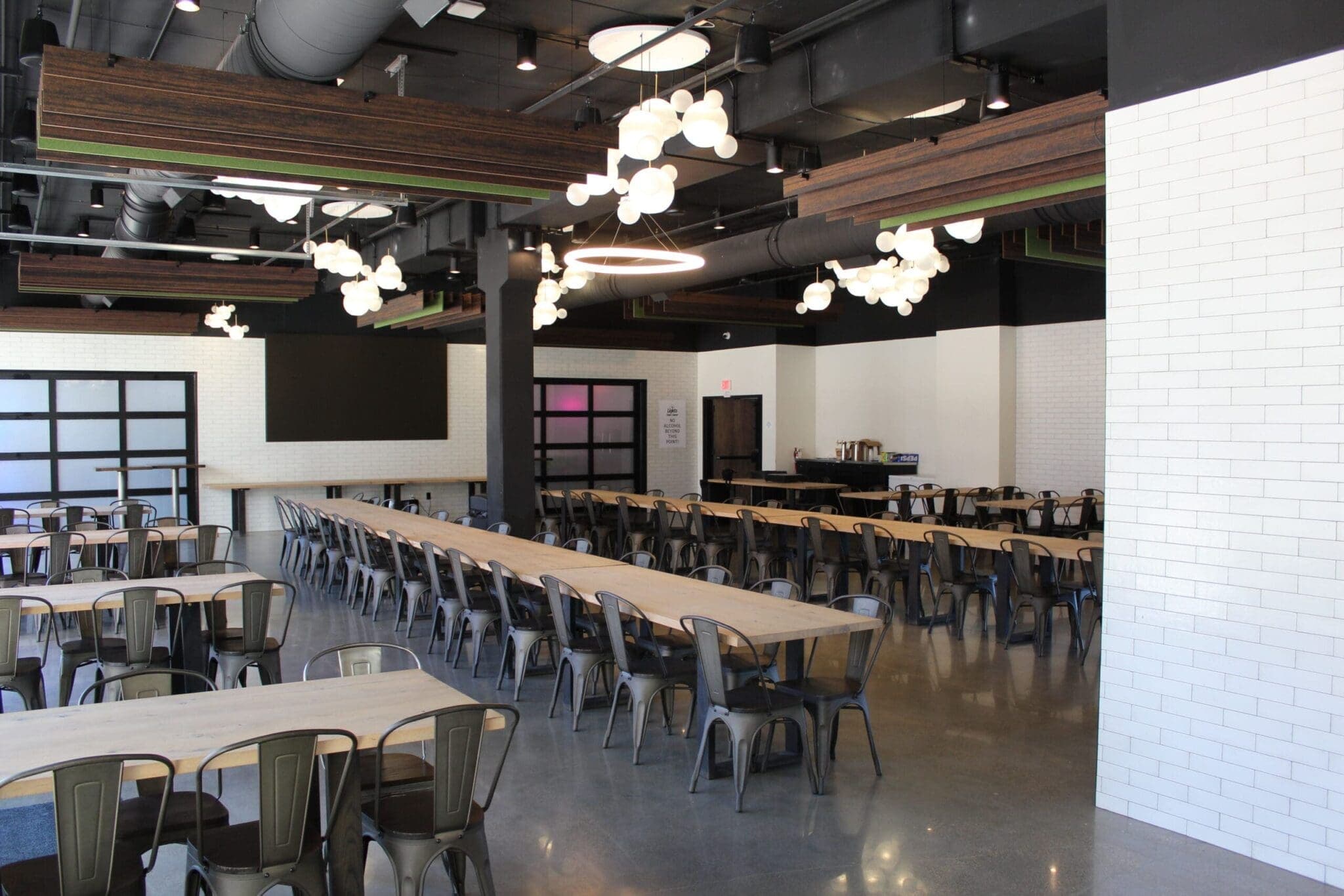 Full room view with white brick wall