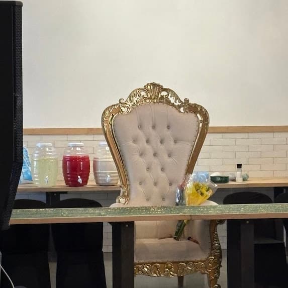 Elegant gold throne chair setup for a quinceañera at The Lights Event Center